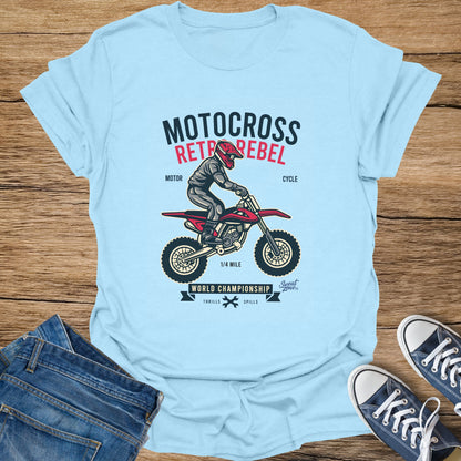 Light blue t-shirt with Motocross Retro Rebel graphic of a rider and motorcycle.