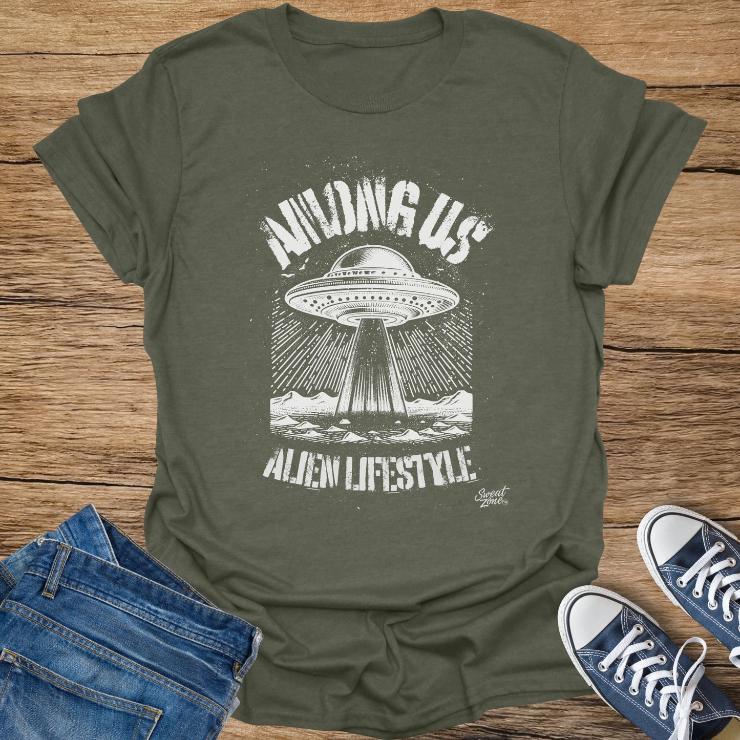 Green t-shirt with "AMONG US ALIEN LIFESTYLE" text and a UFO graphic.