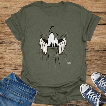 Green t-shirt with cartoon monster face design and small "Sweat Zone" logo.