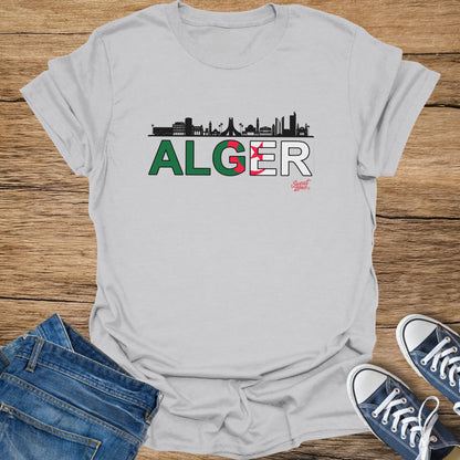 T-shirt with "ALGER" text, Algerian flag colors, and city skyline silhouette.