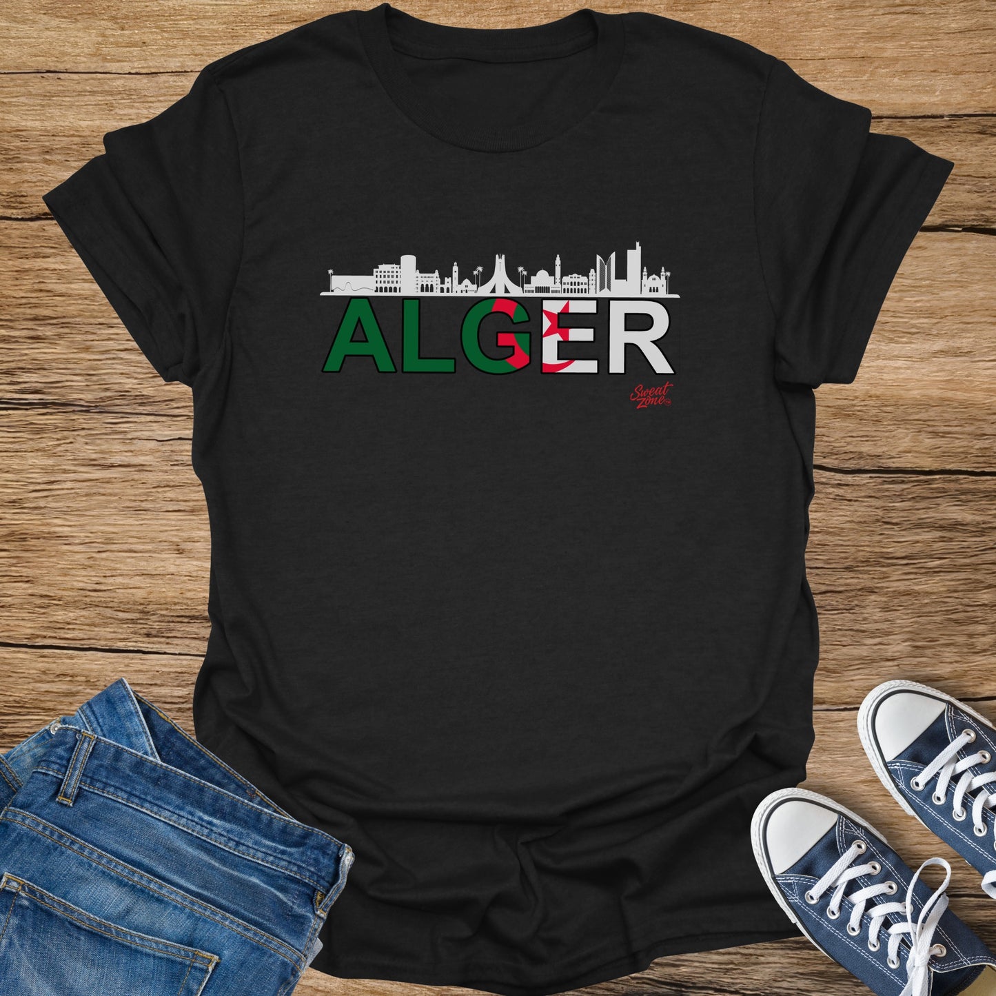 Black t-shirt with "ALGER" text and Algeria flag colors, featuring a city skyline.