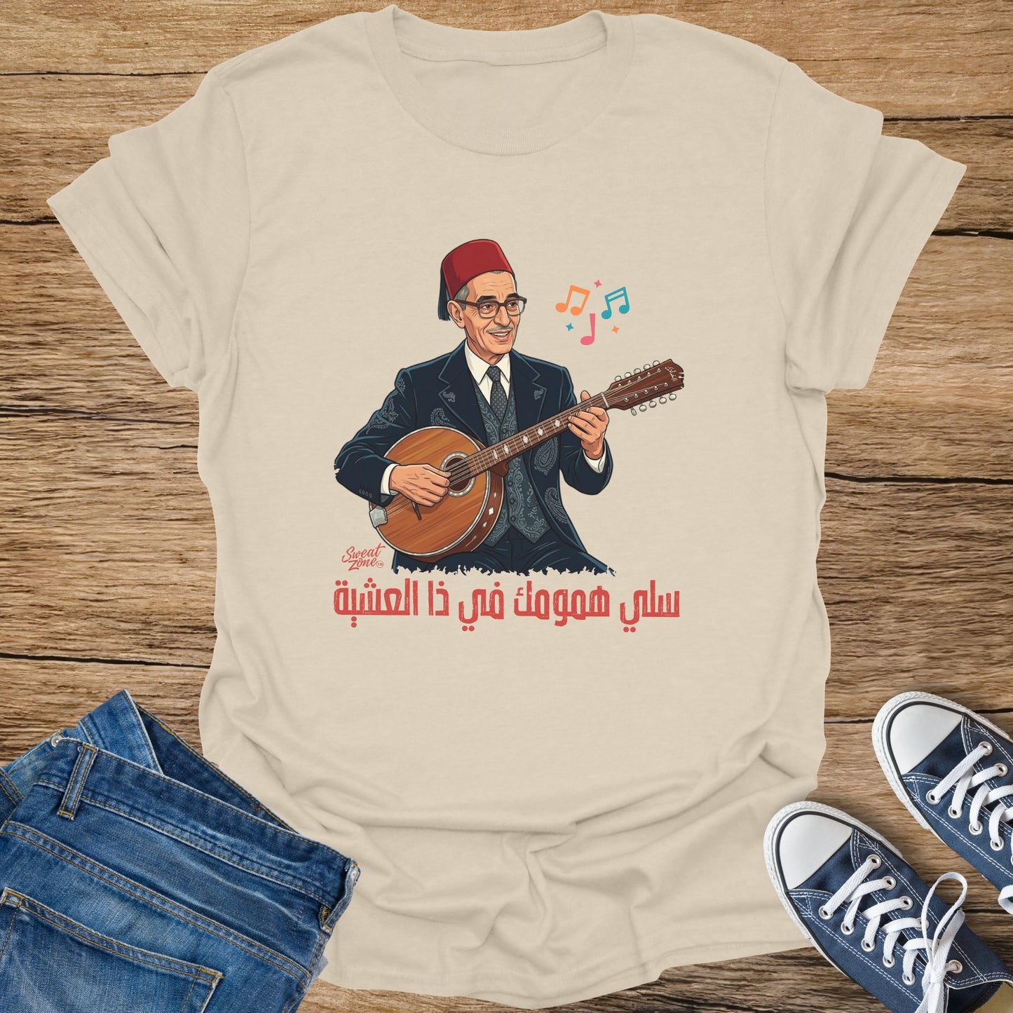 Illustration of a man in a fez playing a lute on a t-shirt.