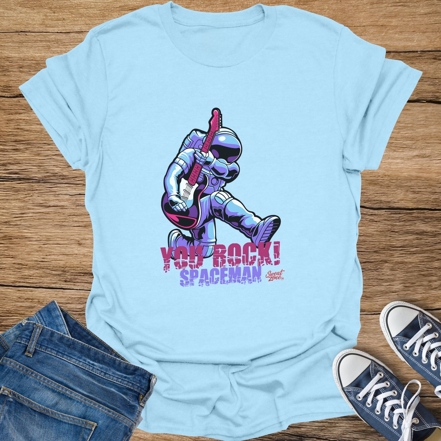 Light blue t-shirt with graphic of an astronaut playing guitar, text "YOU ROCK! SPACEMAN".