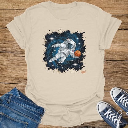 Astronaut floating in space holding a basketball with stars and paint splatters.