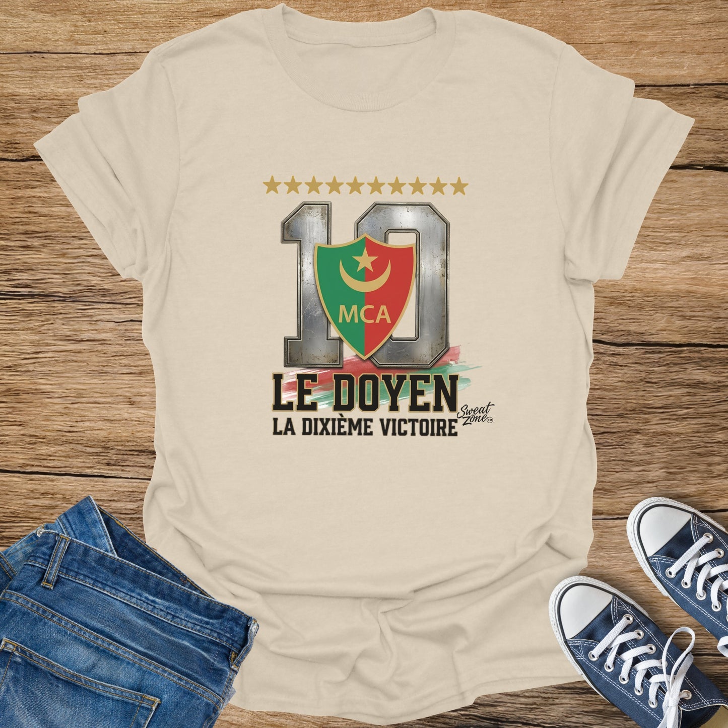 Cream t-shirt with "10 LE DOYEN LA DIXIEME VICTOIRE" and MCA crest graphic.