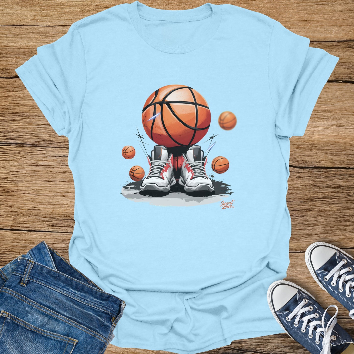 Light blue t-shirt with basketball, sneakers, and smaller basketballs graphic.