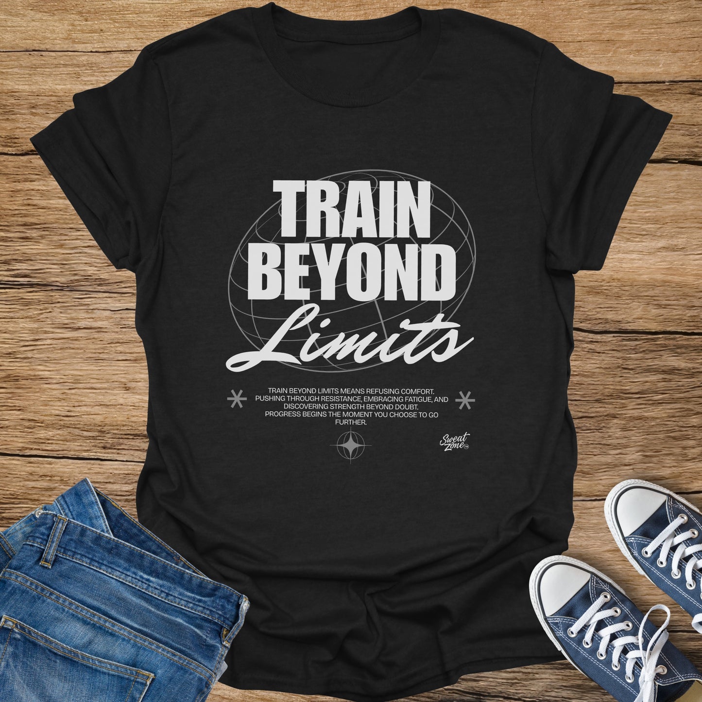 Black t-shirt with "Train Beyond Limits" graphic and inspirational text.