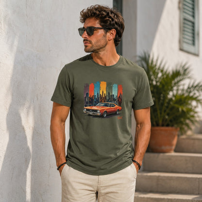 Green t-shirt with graphic of orange car and colorful New York City skyline.