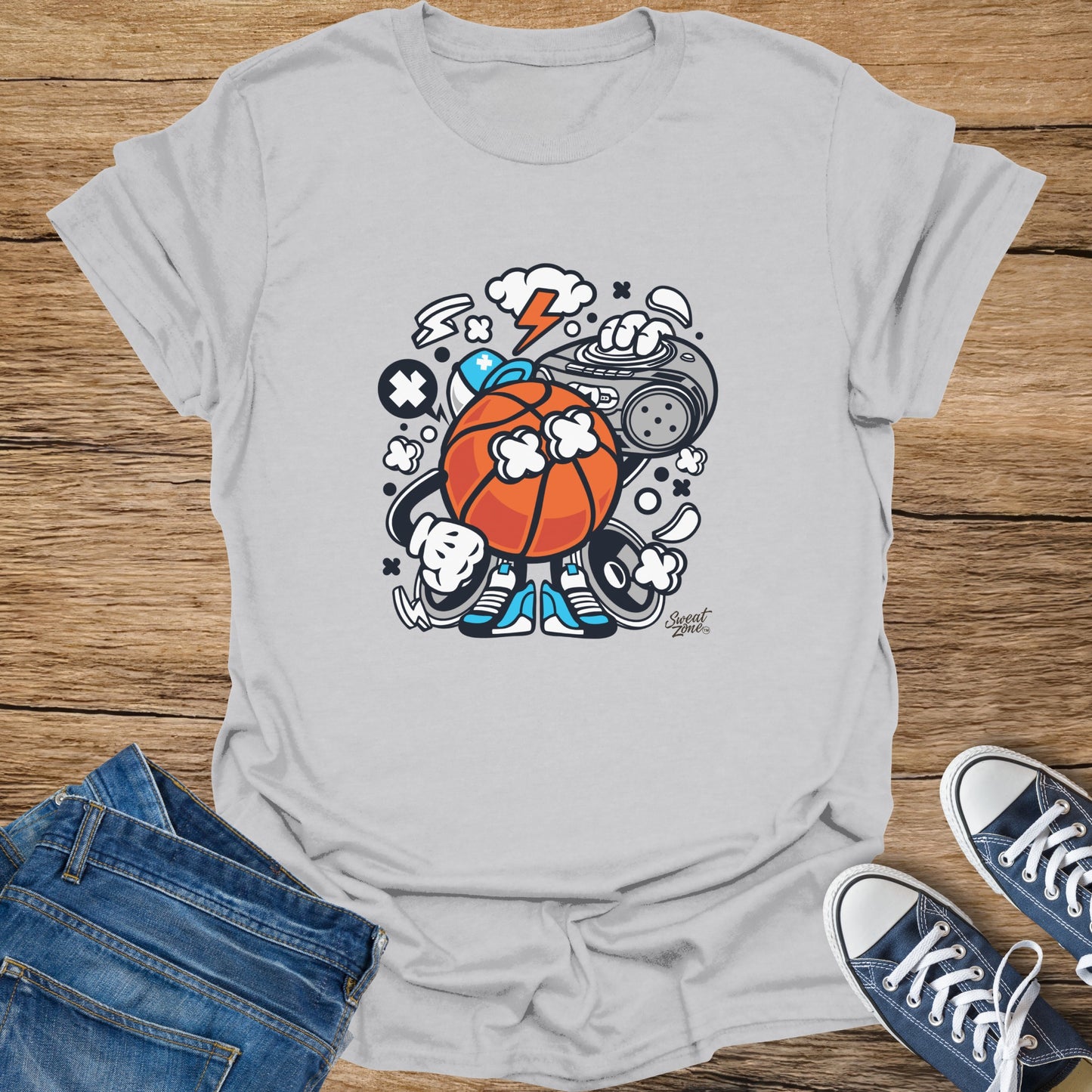 Cartoon basketball character with headphones, boombox, and lightning bolt graphic on white t-shirt.