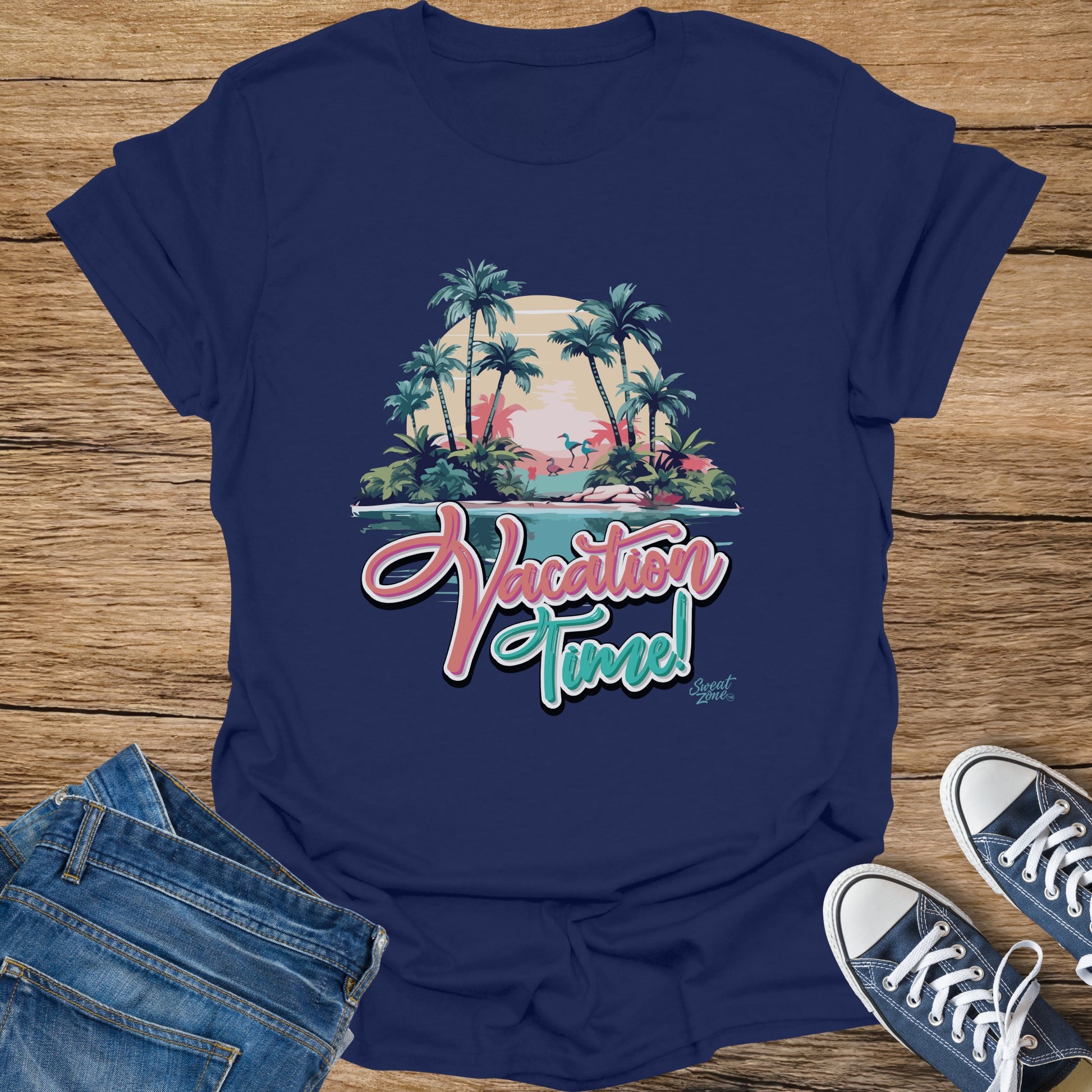 Navy t-shirt with "Vacation Time" in script overlying a tropical sunset scene.