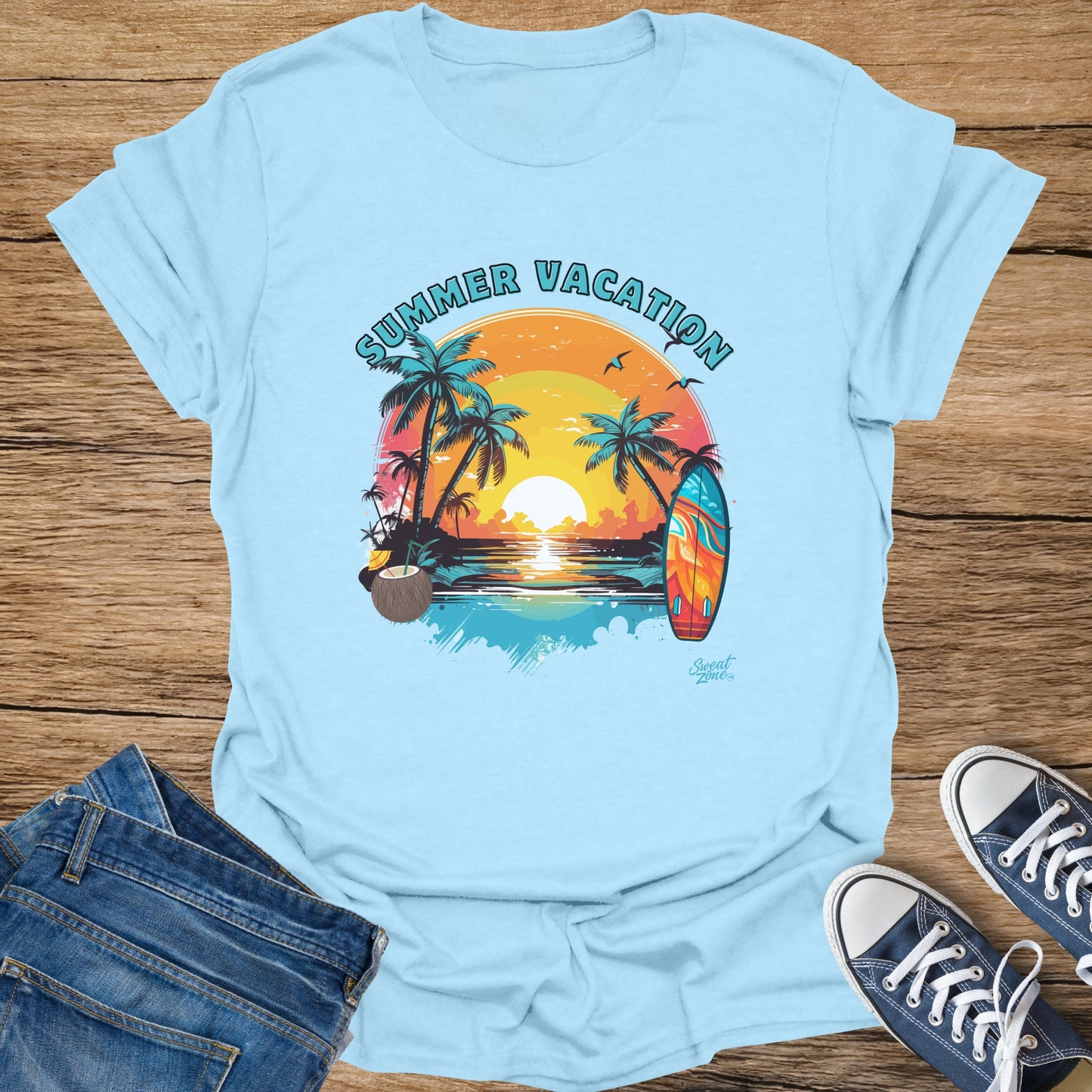 Light blue t-shirt with "SUMMER VACATION" text and tropical beach sunset design.