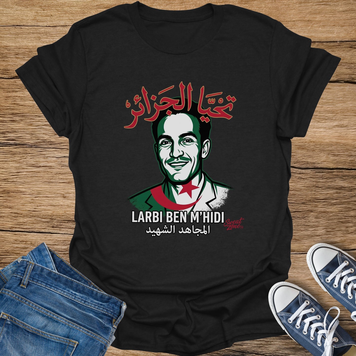 Black t-shirt with portrait of Larbi Ben M'hidi, Arabic text, and Algerian flag colors.