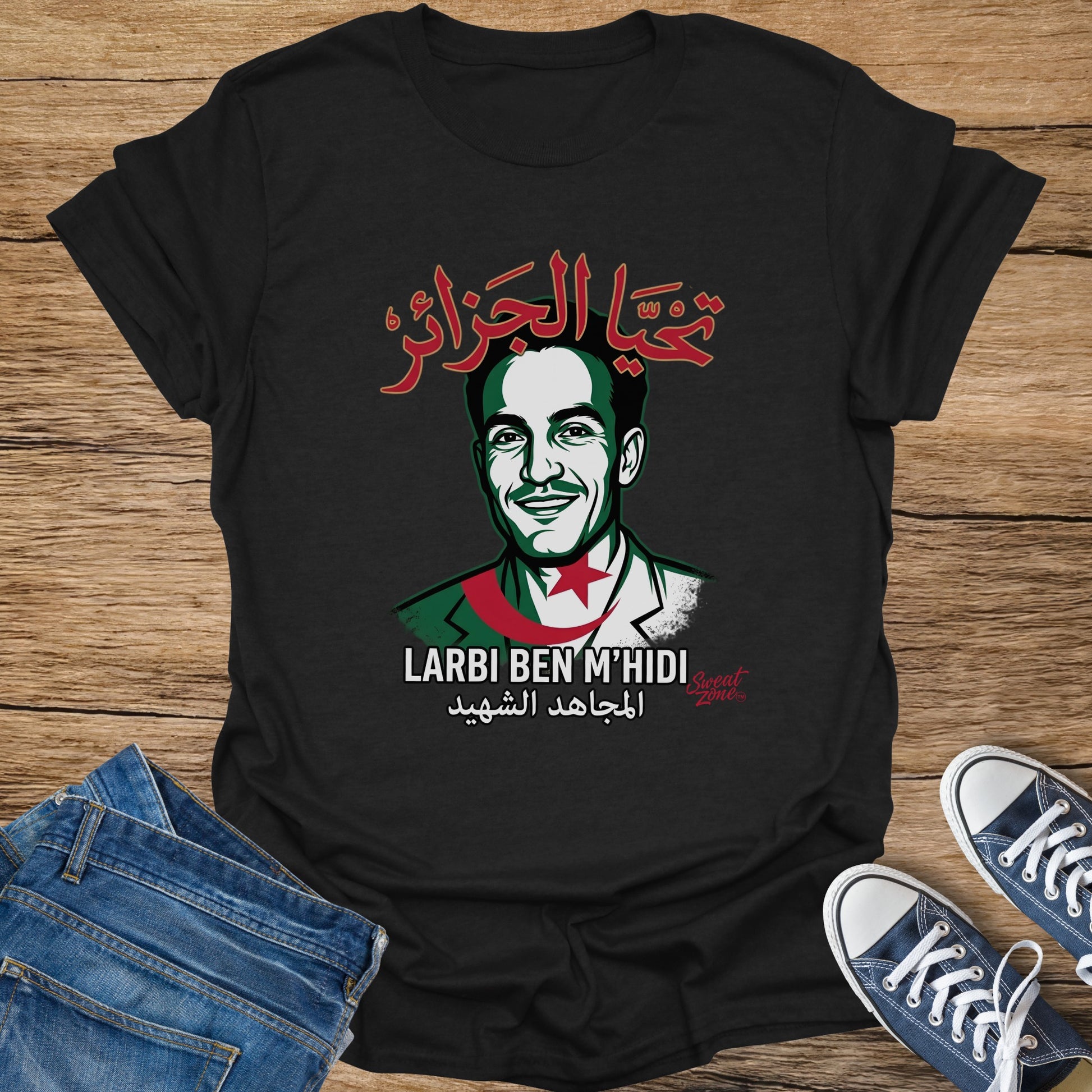 Black t-shirt with portrait of Larbi Ben M'hidi, Arabic text, and Algerian flag colors.