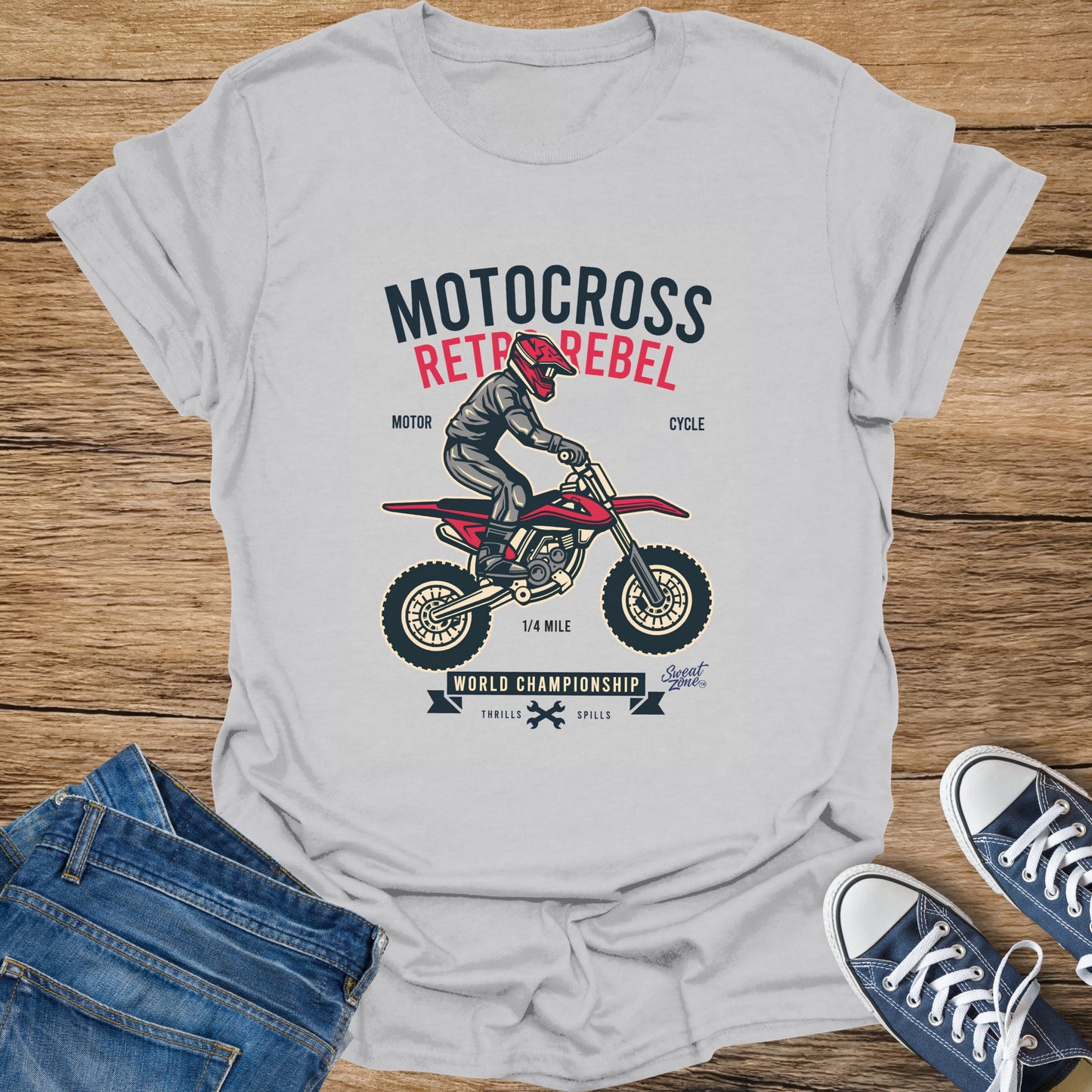 Motocross Rebel graphic on a light grey t-shirt with rider and motorcycle.