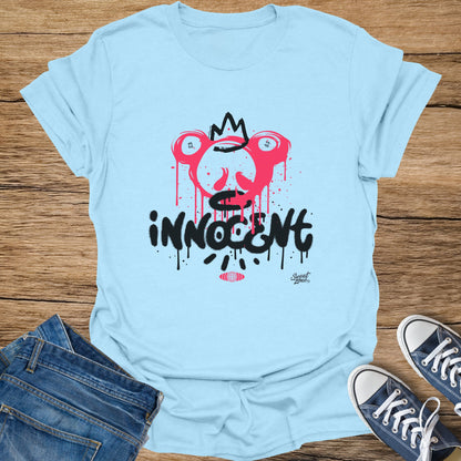 Light blue t-shirt with a pink graphic and black "INNOCENT" text.