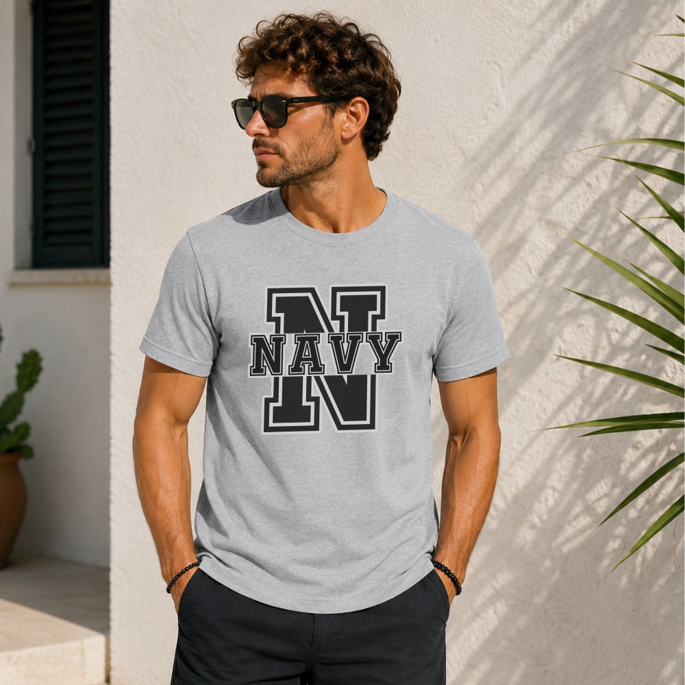 Grey t-shirt with N Navy design on chest worn by a man.