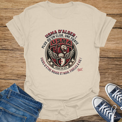 USMA D'Alger t-shirt with lion logo, text "Fiers d'être rouge et noir, fidèles à vie!"