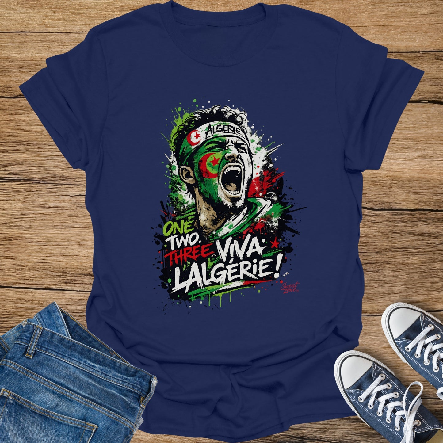 Algerian fan screaming with flag paint, "ONE TWO THREE, VIVA L'ALGERIE!" text.