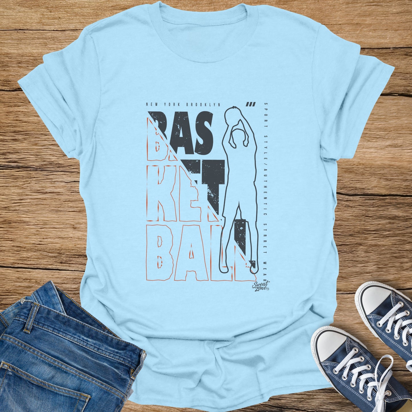 Light blue t-shirt with "Basketball" text and graphics of a player.