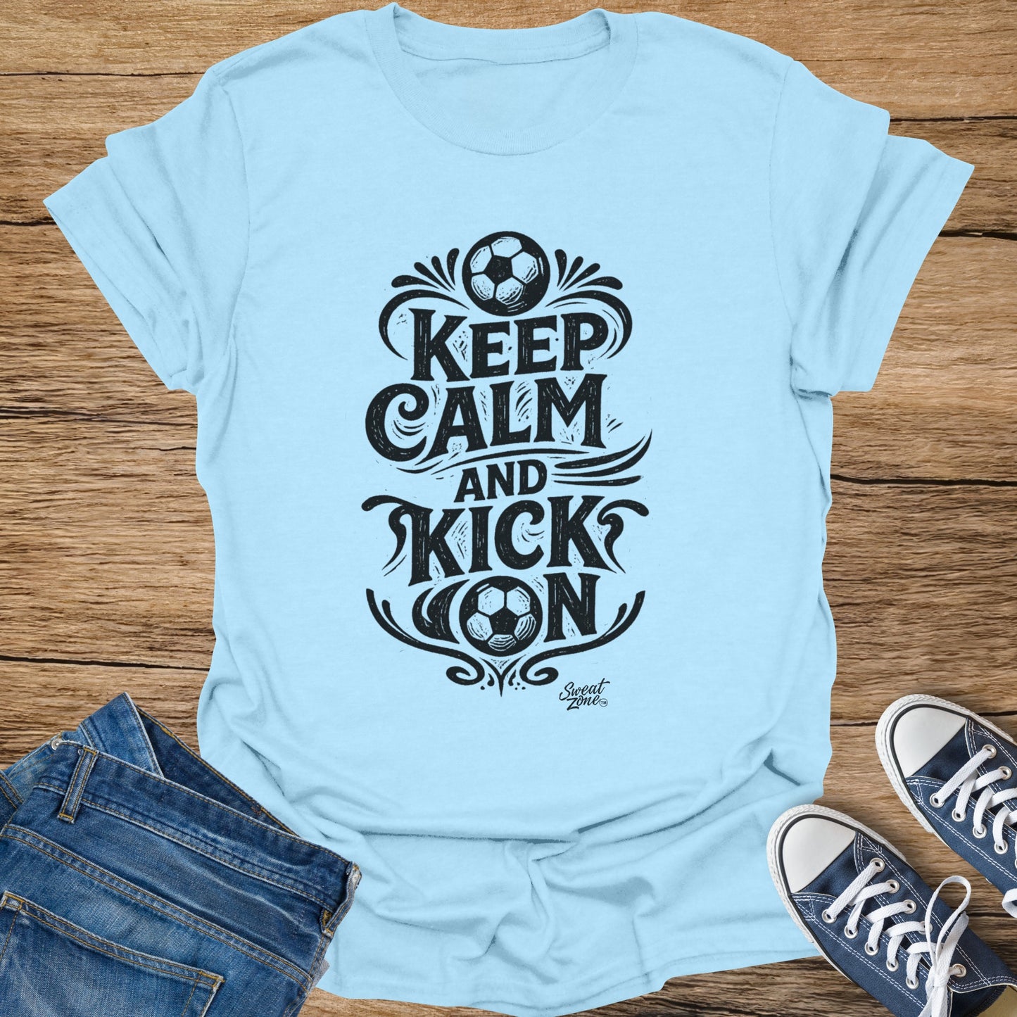 Light blue t-shirt with 'Keep Calm and Kick On' and soccer ball graphic.