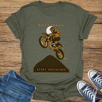 Green t-shirt with motocross rider graphic and "Sport Adventure" text.