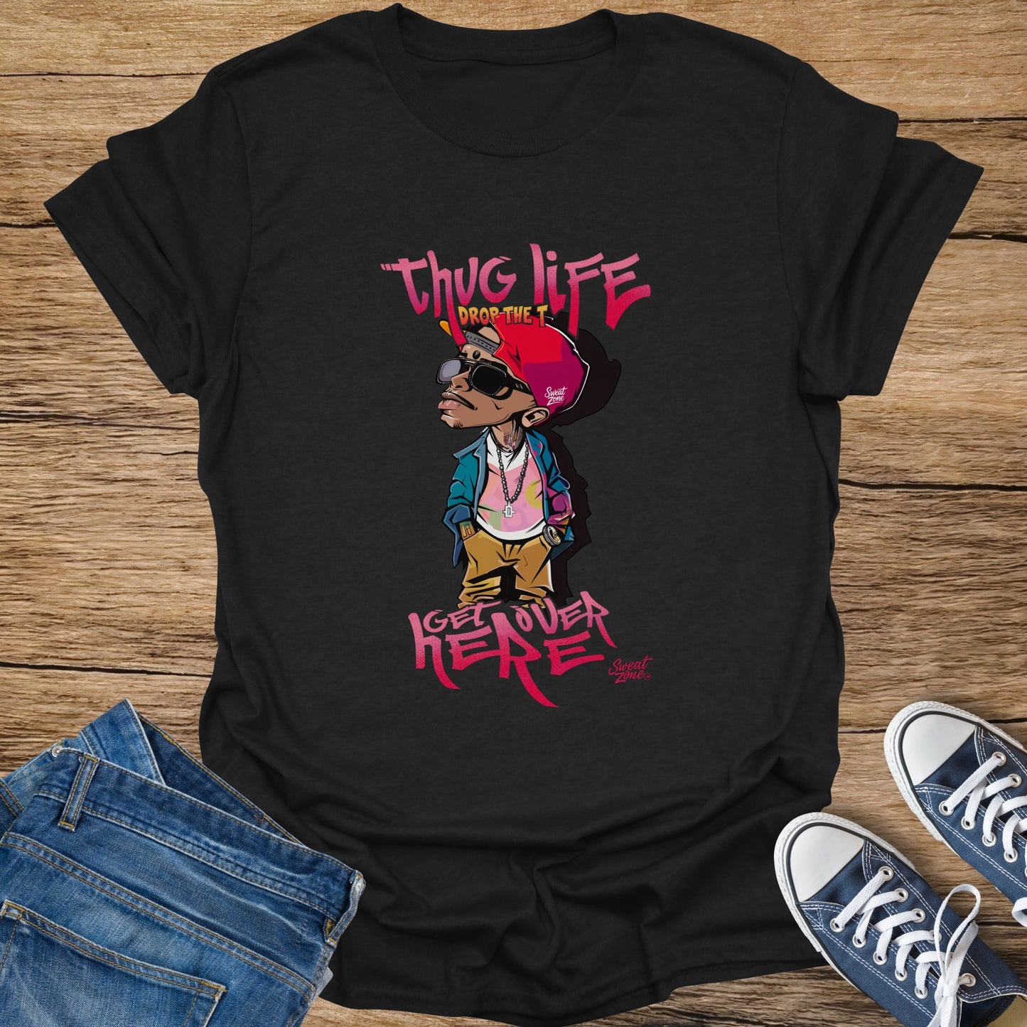 Black t-shirt with cartoon character and text "Thug Life", "Drop The T", "Get Over Here".