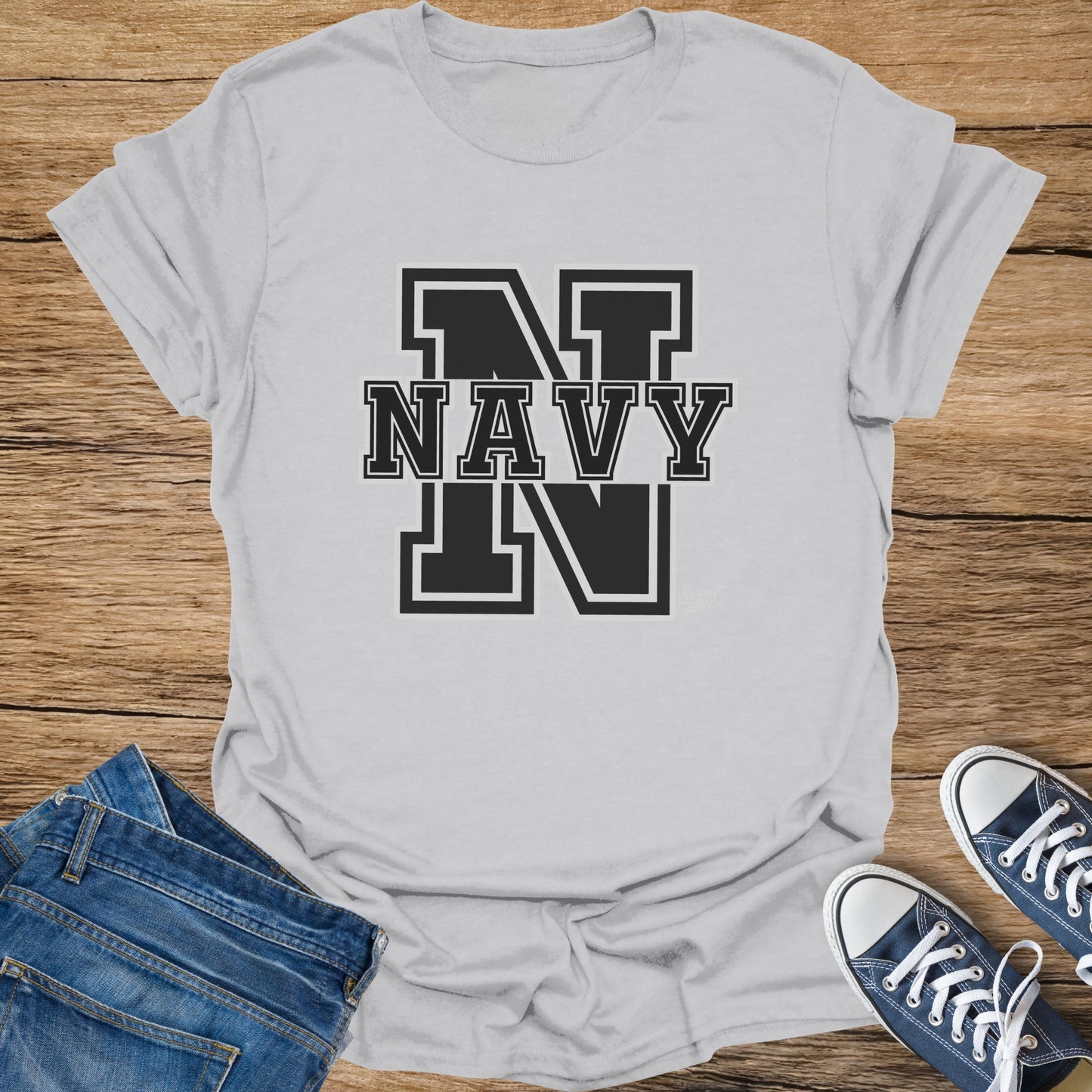 White t-shirt with black "NAVY" text and block letter "N" design.
