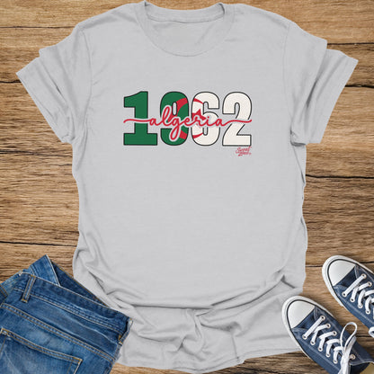 Gray t-shirt with "1962 Algeria" text, featuring Algerian flag colors and "Sweat Zone" logo.