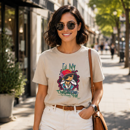 Tan t-shirt with "In My Thug Life Era" graphic on a woman outdoors.