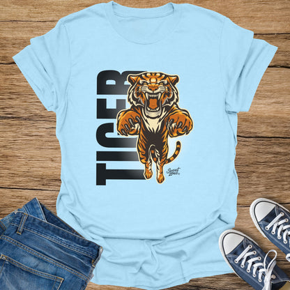 Light blue t-shirt with a roaring tiger graphic and "TIGER" text.