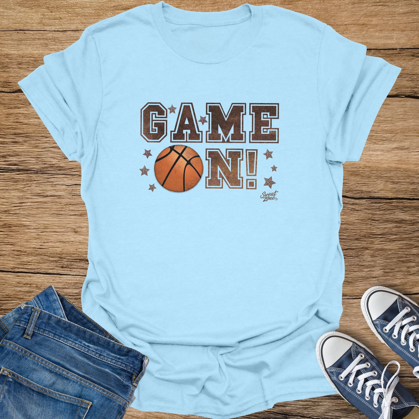 Light blue t-shirt with brown "GAME ON!" text and basketball graphic.