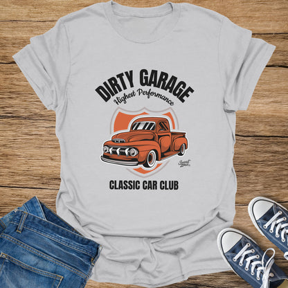 Grey t-shirt with distressed "Dirty Garage Highest Performance" text and orange pickup truck graphic.