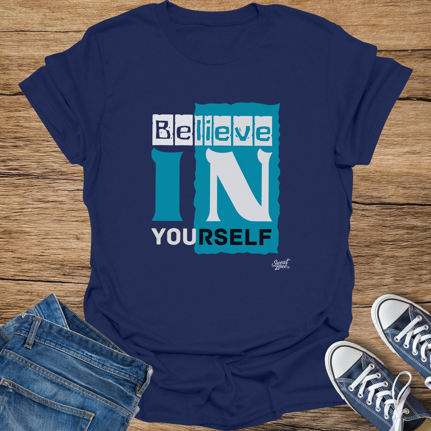 Navy t-shirt with "Believe IN YOURSELF" graphic and small "Sweat Zone" logo.