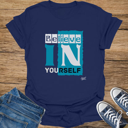 Navy t-shirt with "Believe IN YOURSELF" graphic and small "Sweat Zone" logo.