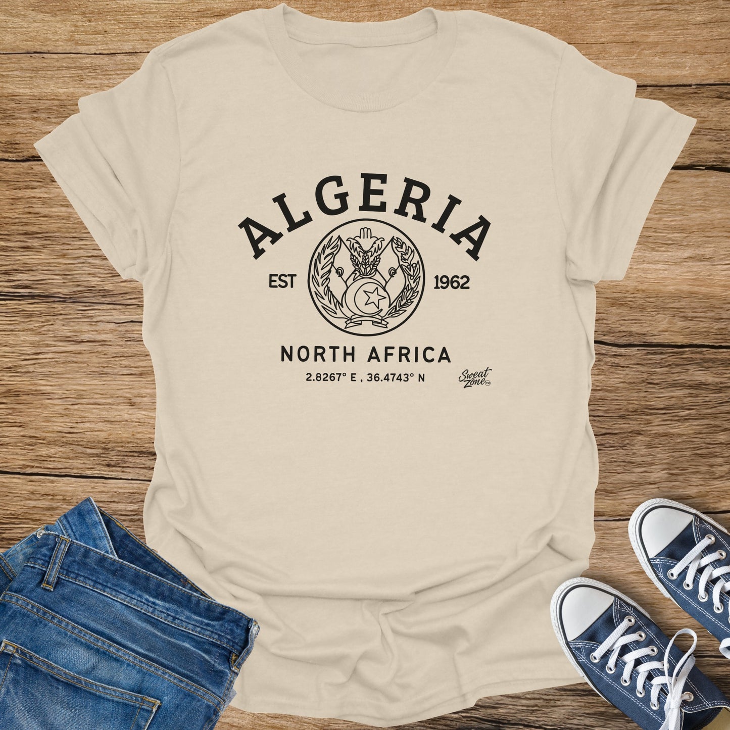 T-shirt with "Algeria Est 1962 North Africa" and coordinates.