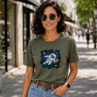 Green t-shirt with graphic of a basketball-playing astronaut in space