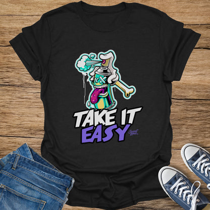 Black t-shirt with cartoon spray can and "Take it Easy" text.