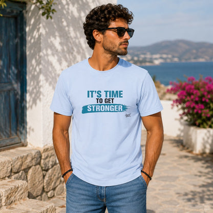 Light blue t-shirt with "IT'S TIME TO GET STRONGER" graphic and a handwritten logo.