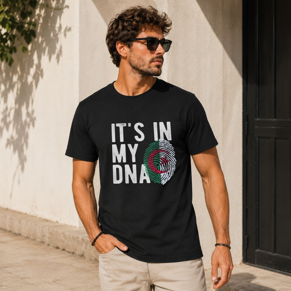 Man wearing black t-shirt with "It's In My DNA" and Algerian flag fingerprint.