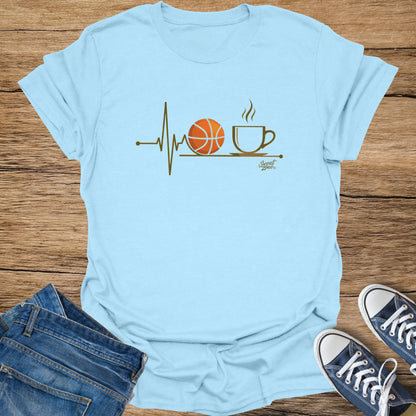 Light blue t-shirt with "Sweat Zone" logo featuring a heartbeat, basketball, and coffee cup.