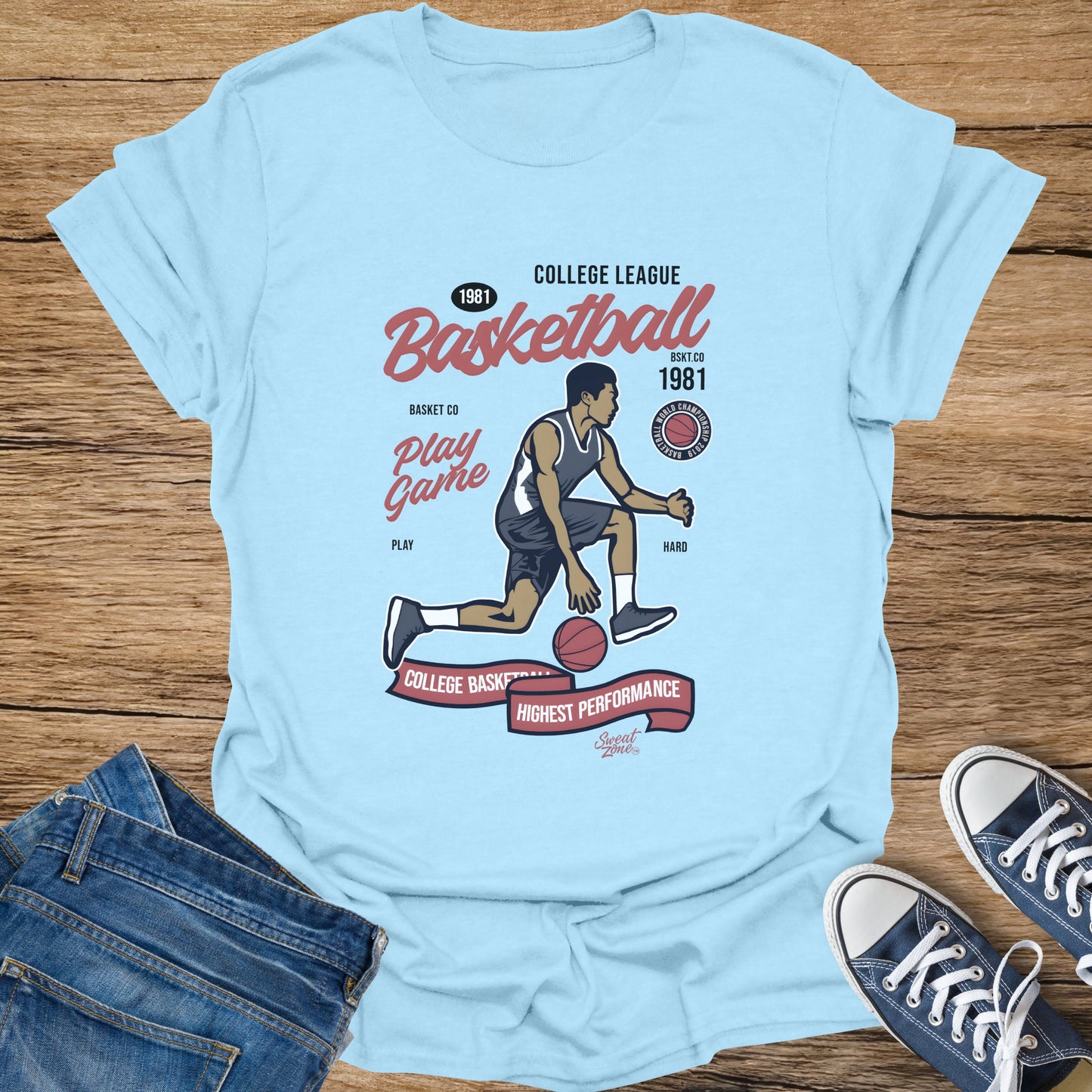 Light blue t-shirt with basketball graphic and text "College League Basketball 1981".