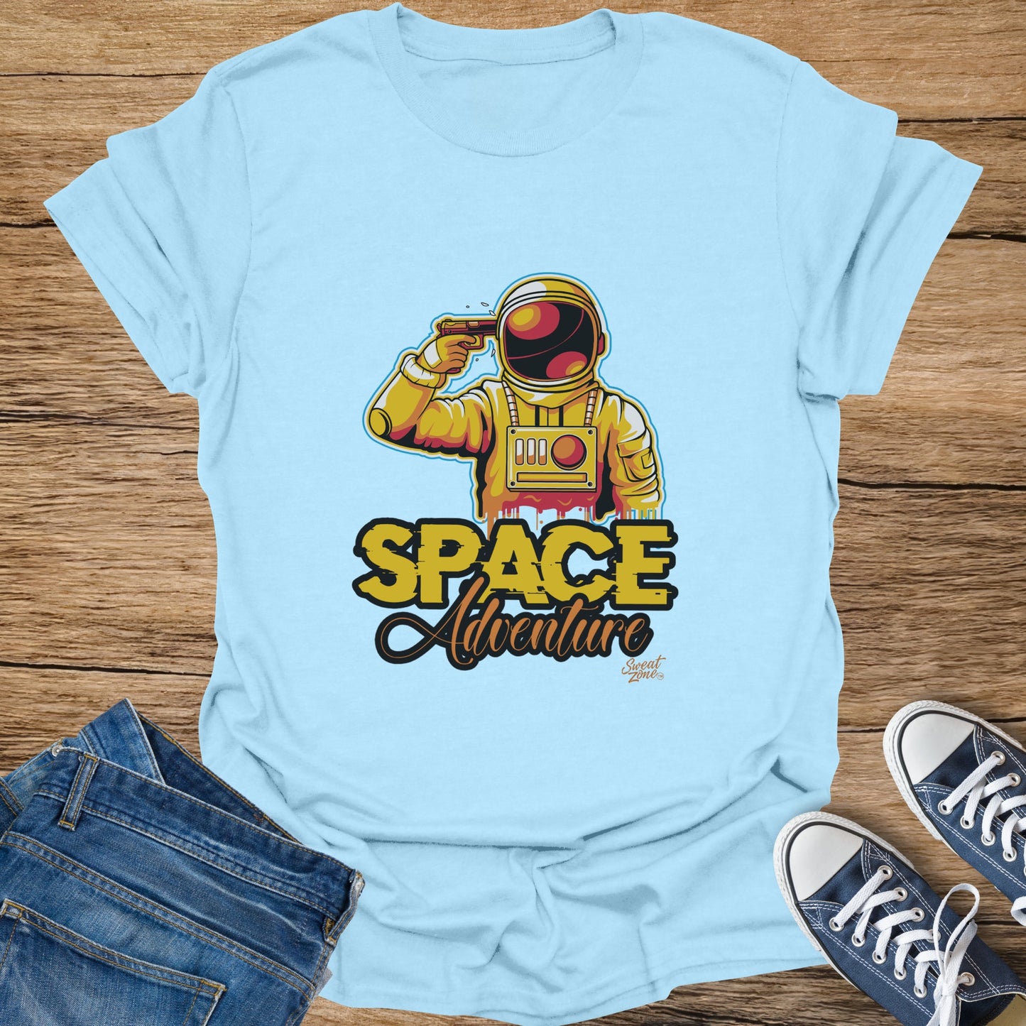 Light blue t-shirt with astronaut graphic and "Space Adventure" text.
