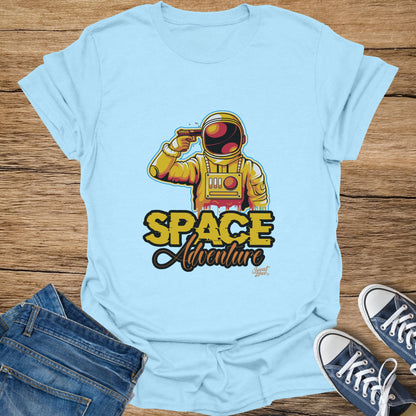 Light blue t-shirt with astronaut graphic and "Space Adventure" text.