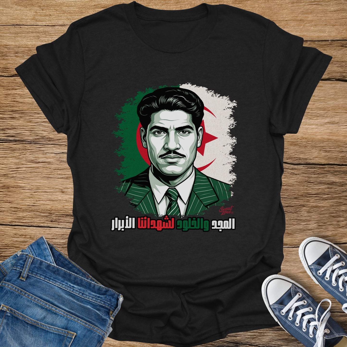 Black t-shirt with a portrait of a man, Algerian flag, and Arabic text.
