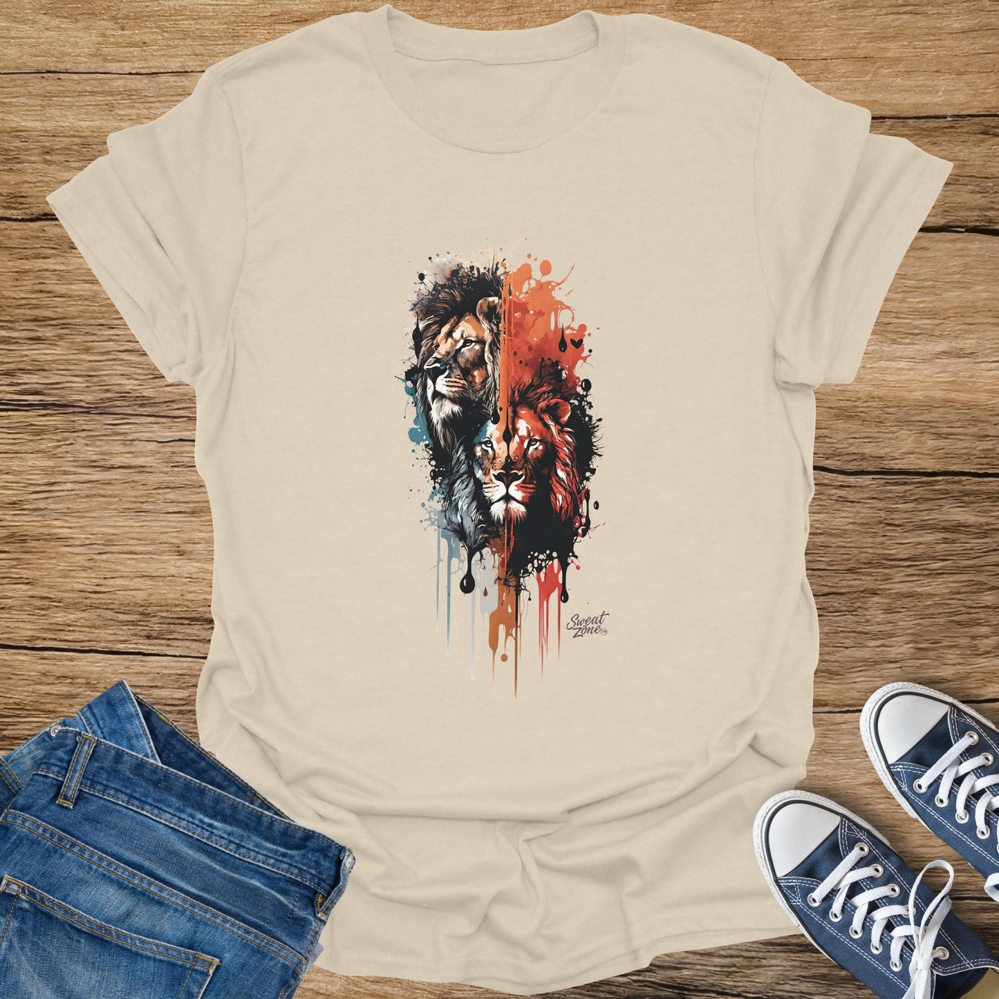 Cream t-shirt with two watercolor lions and "Sweat Zone" logo.