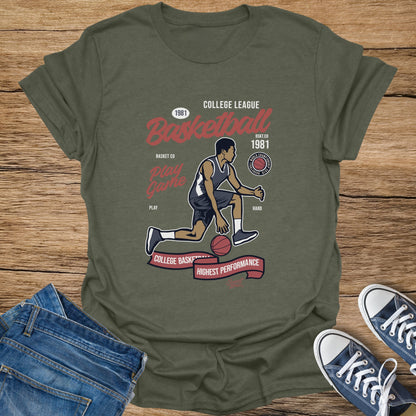 Olive green t-shirt with "College League Basketball" graphic and player dribbling.