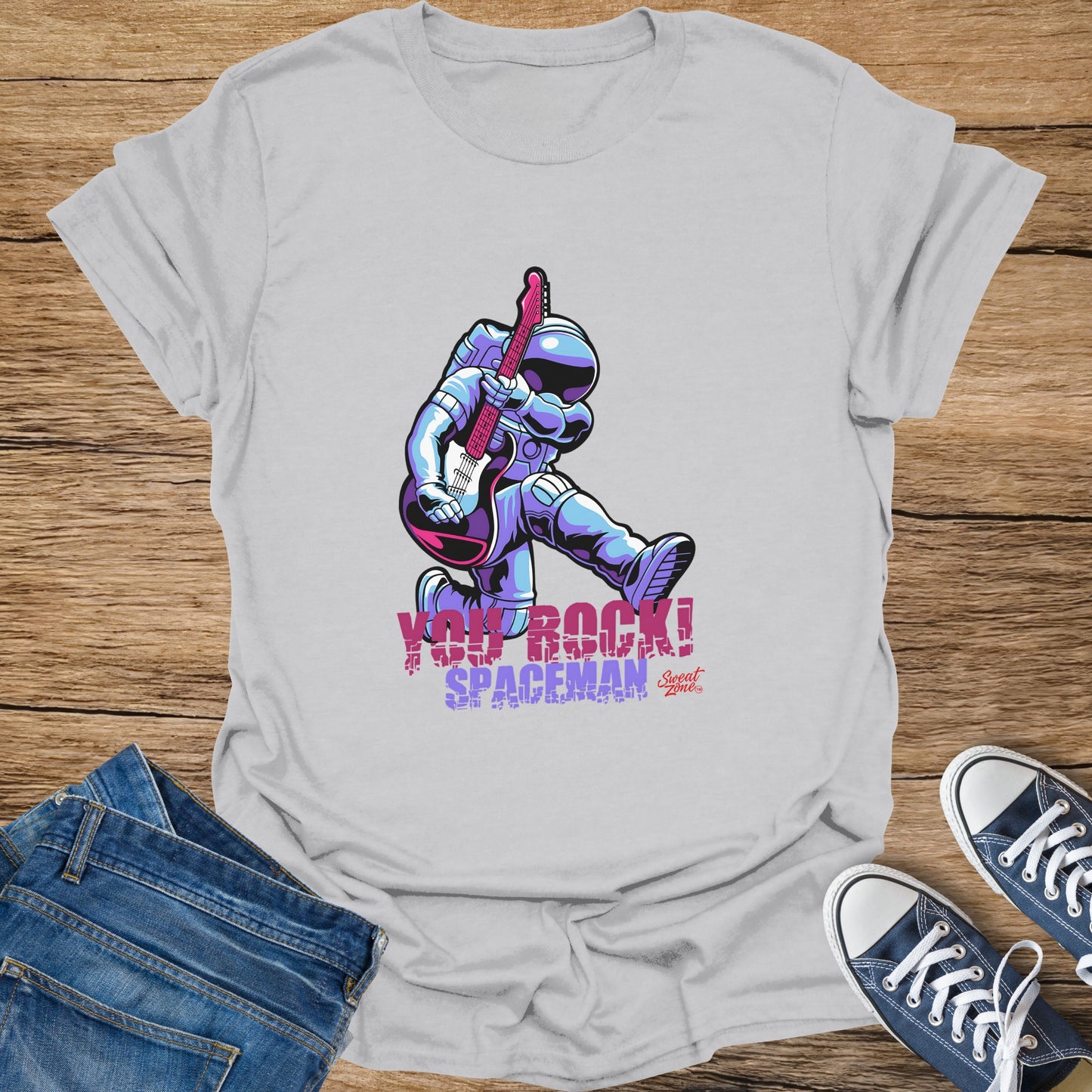 Astronaut playing guitar with text "YOU ROCK! SPACEMAN".